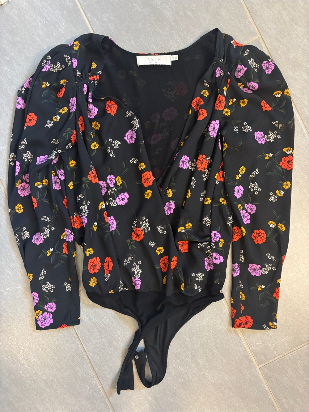 ASTR Black Floral Wrap Bodysuit with Red, Purple & Yellow Print